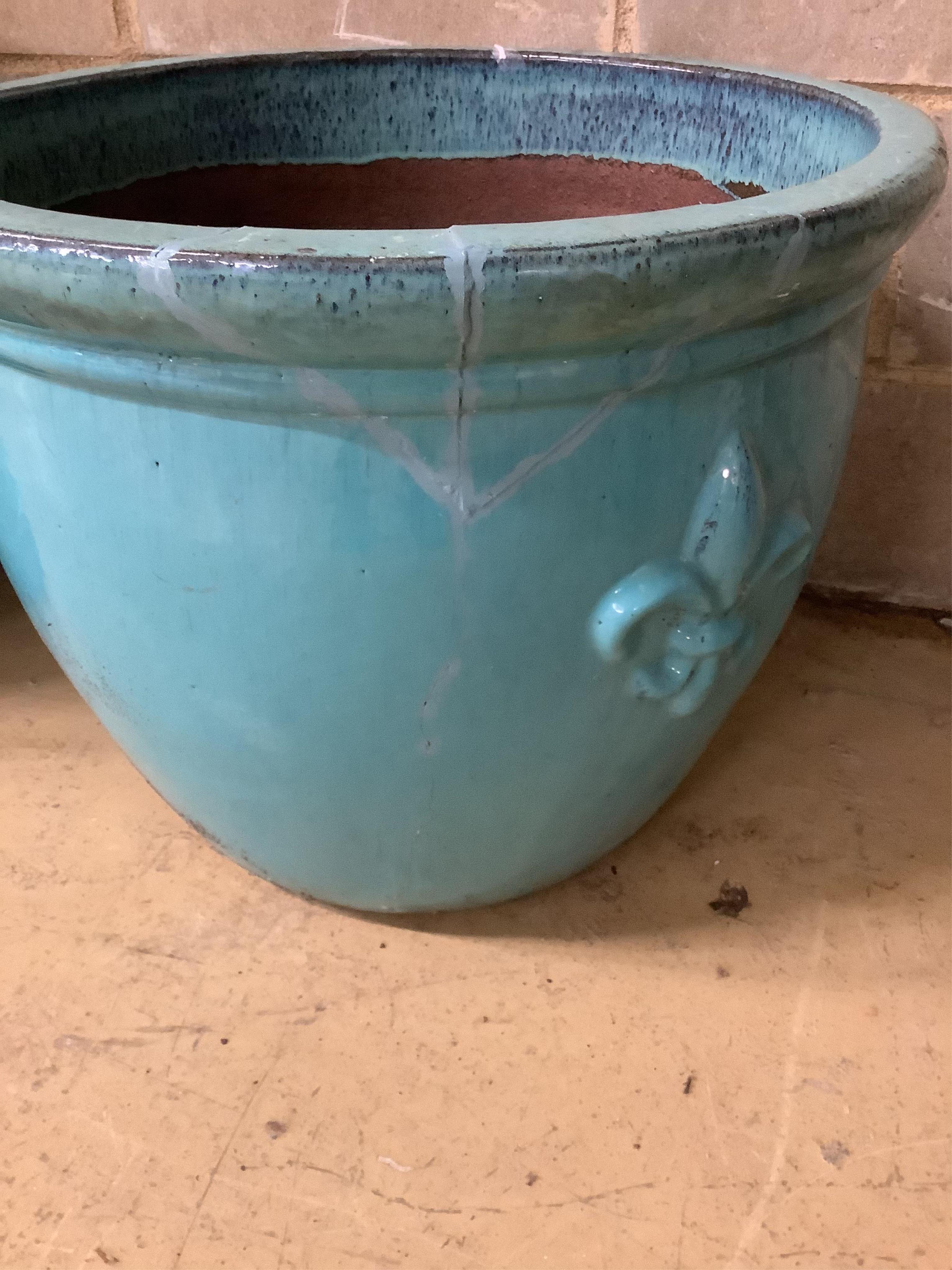 Two large turquoise glazed circular earthenware garden planters, larger diameter 64cm, height 49cm (one a.f.). Condition - fair to good